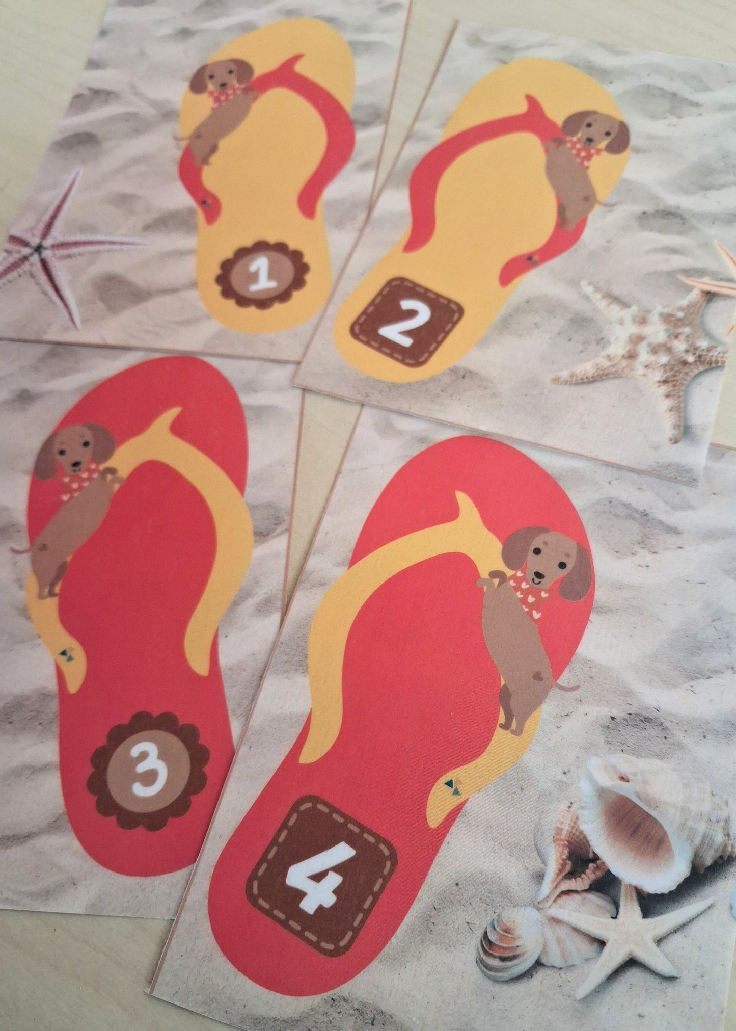 cijferkaarten kleuters, groep 1/2, thema strand, thema vakantie, thema zomer, cijferkennis, cijferherkenning, spel cijfers, bewegend leren rekenen, de themahoek, spelletjes met cijfers, inloop